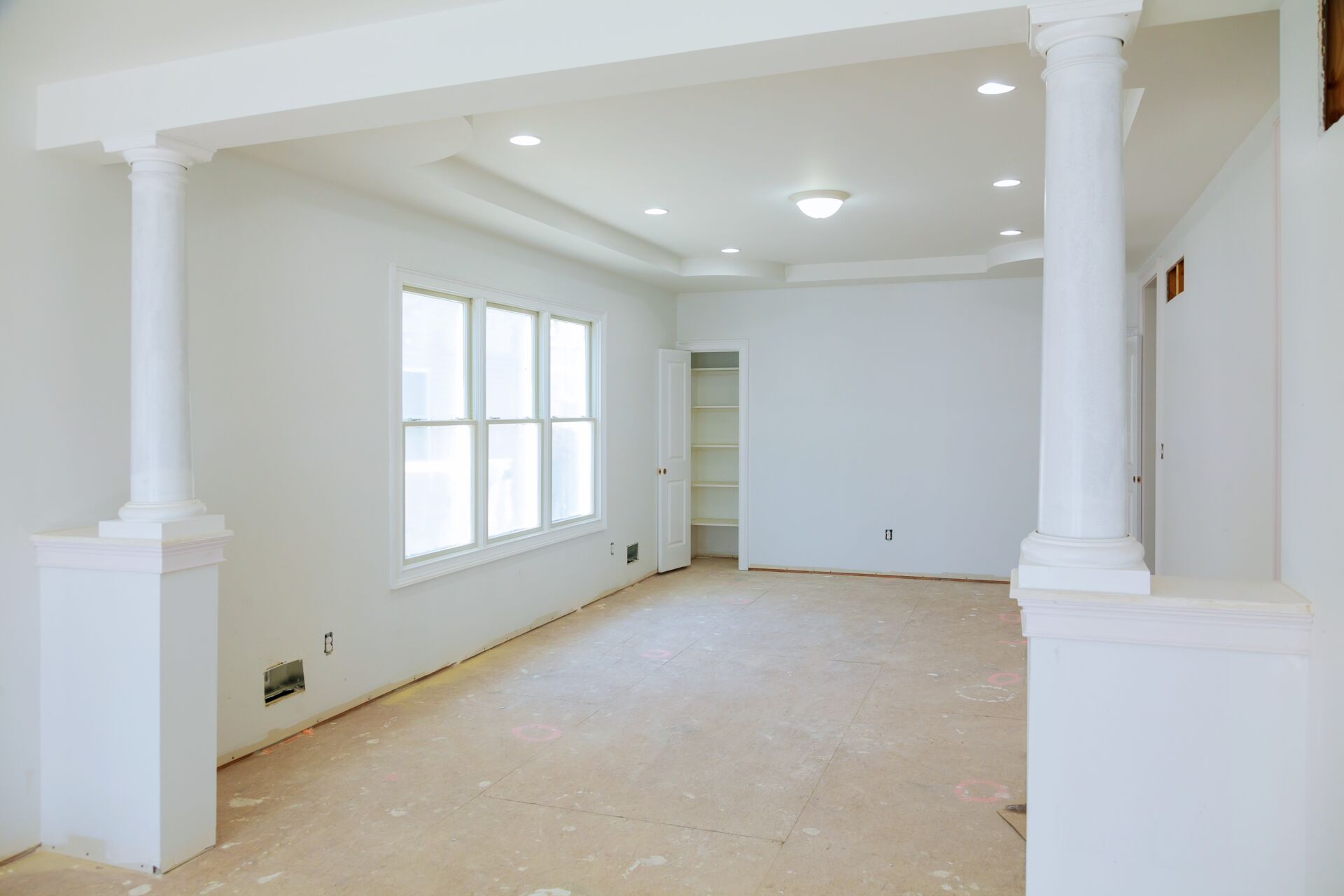 White interior of new home with plastering completed